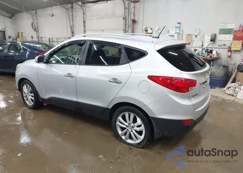 2011 Hyundai Tucson Limited z USA, uszkodzony, nr VIN KM8JUCAC8BU259698
